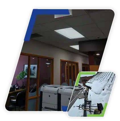 View looking up at an office ceiling with square tiles and fluorescent lights.